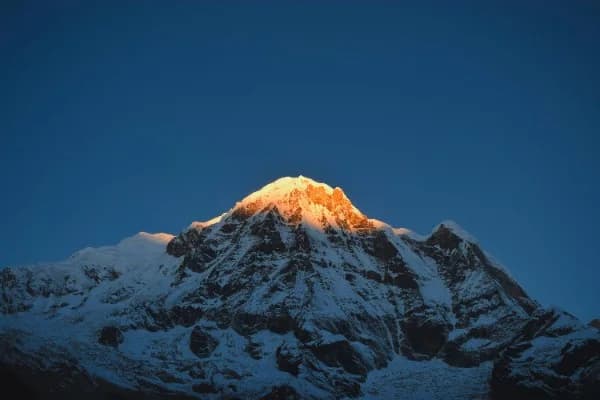 Golden sunset over mountain ridge
