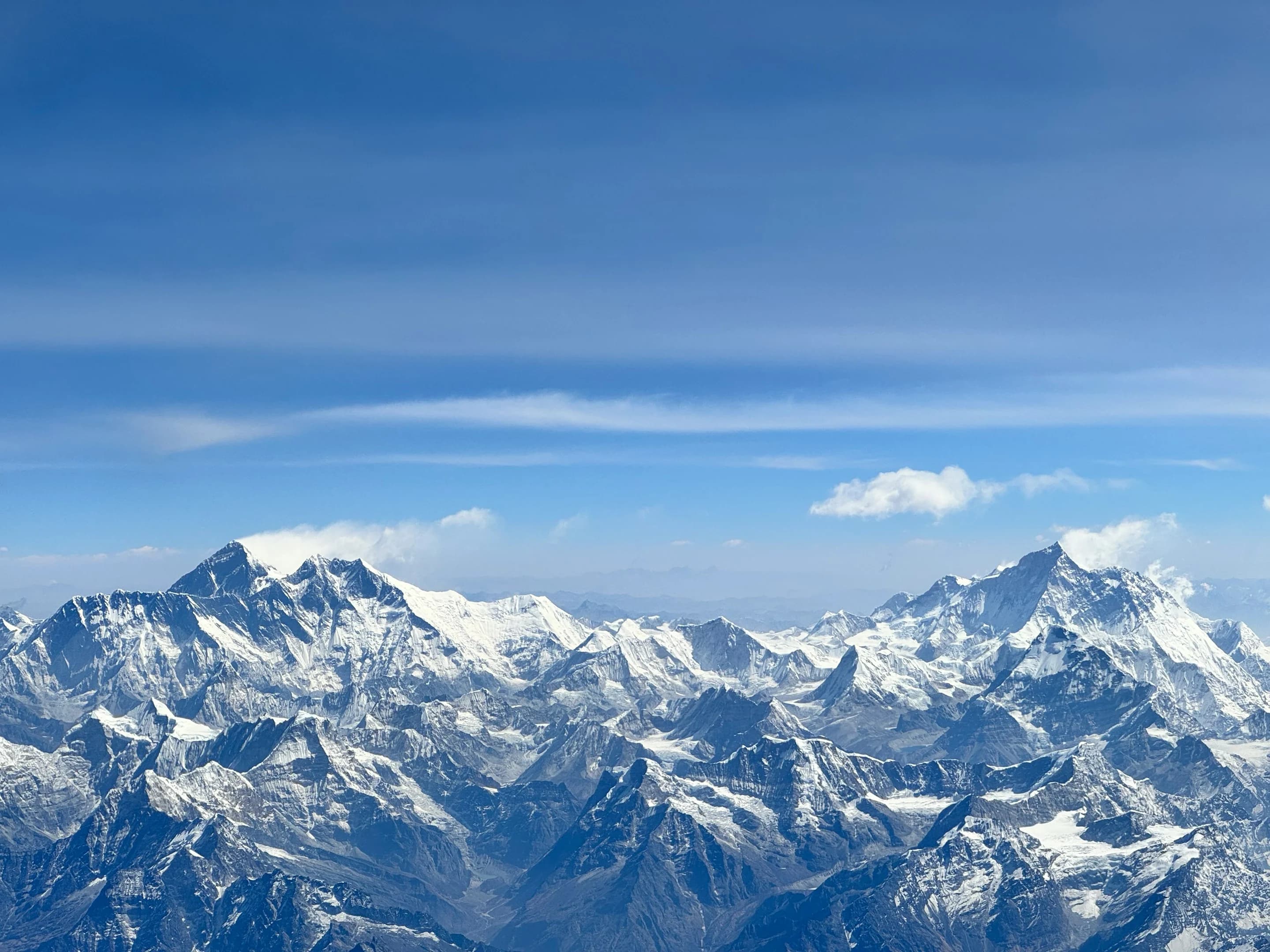 Snowy peak against blue sky