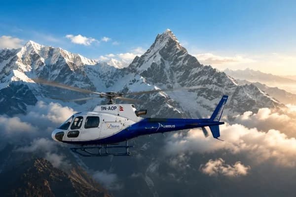 Snowy mountain landscape with helicopter