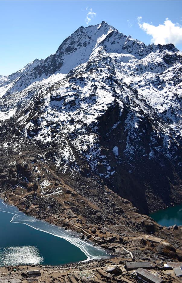 Mountain range with helicopter silhouette